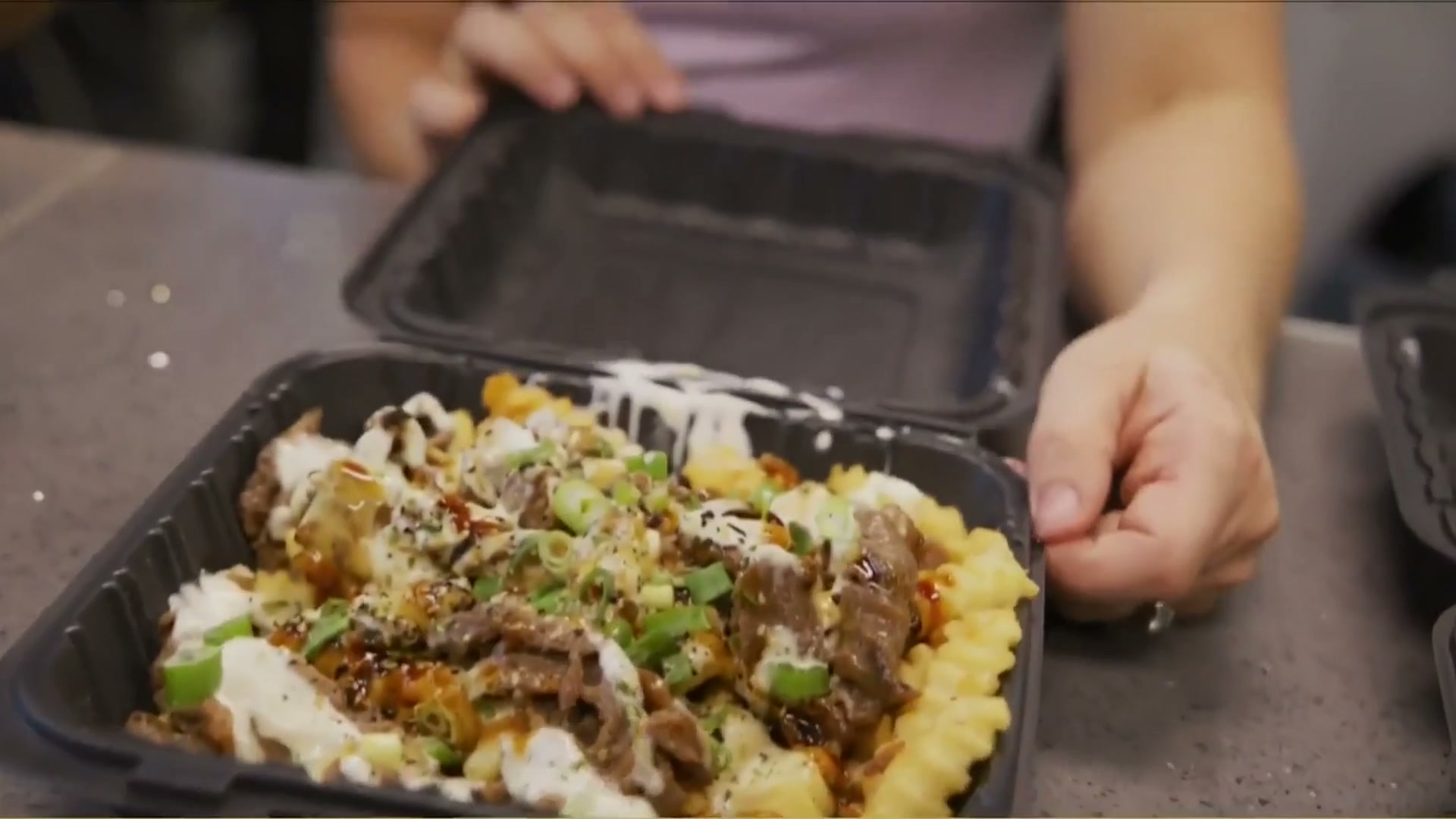 Teri Beef Fries with house sauces, furikake, and green onions